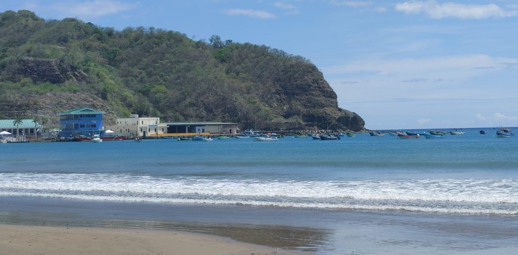 Beach with plenty of canoes.