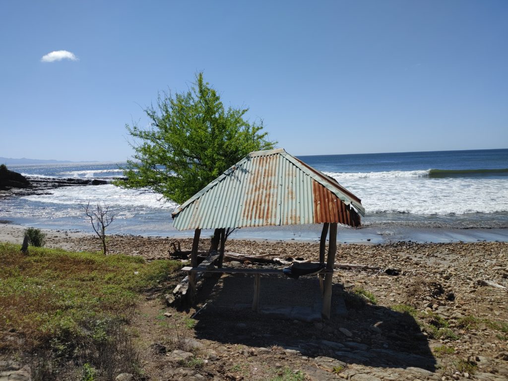 Small shed on a beach.