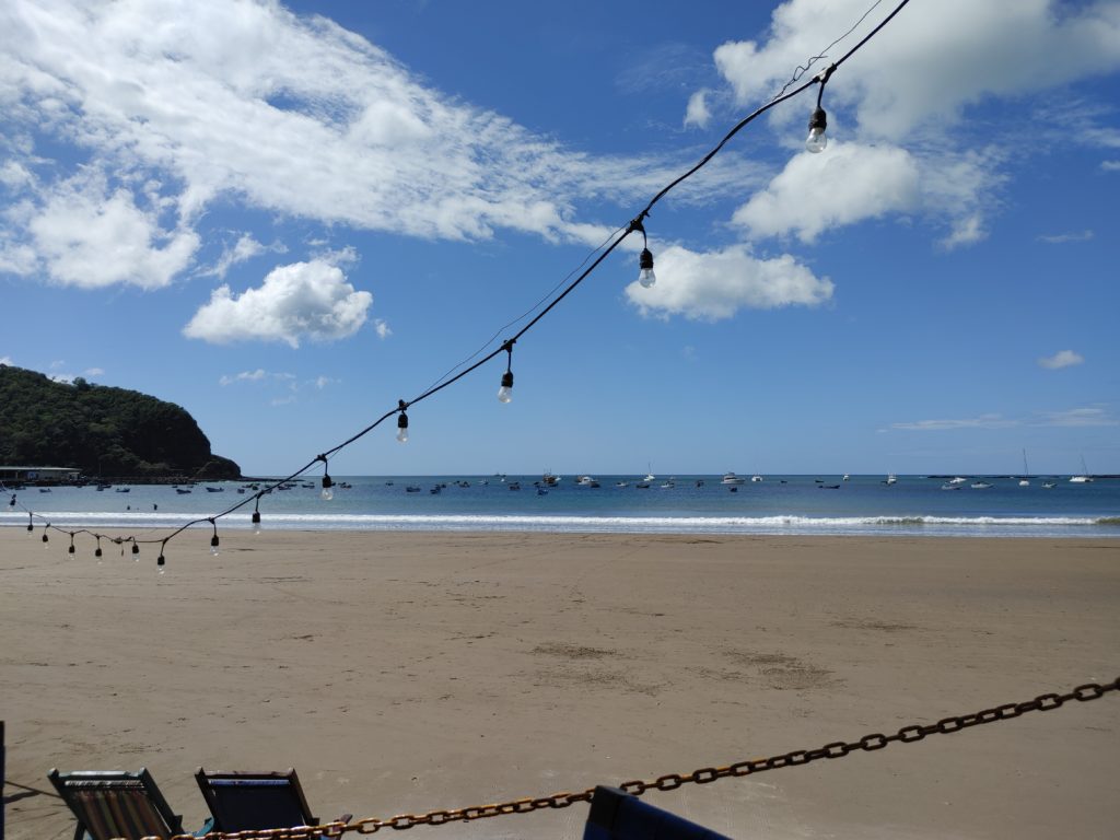 Hanging lights on beach.