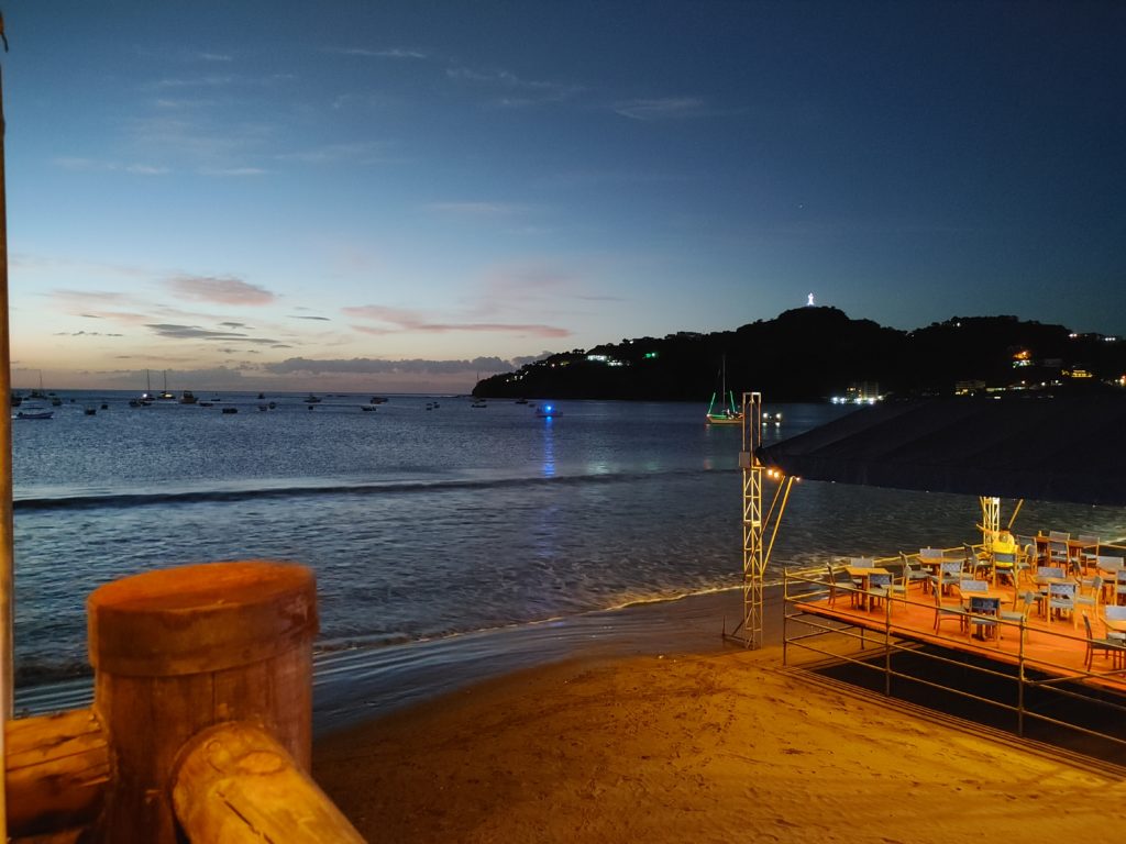 Beach restaurant at night.