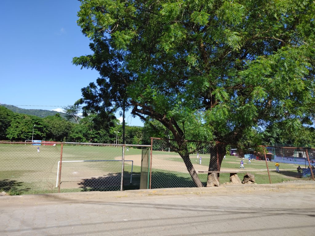 Soccer field with soccer players.