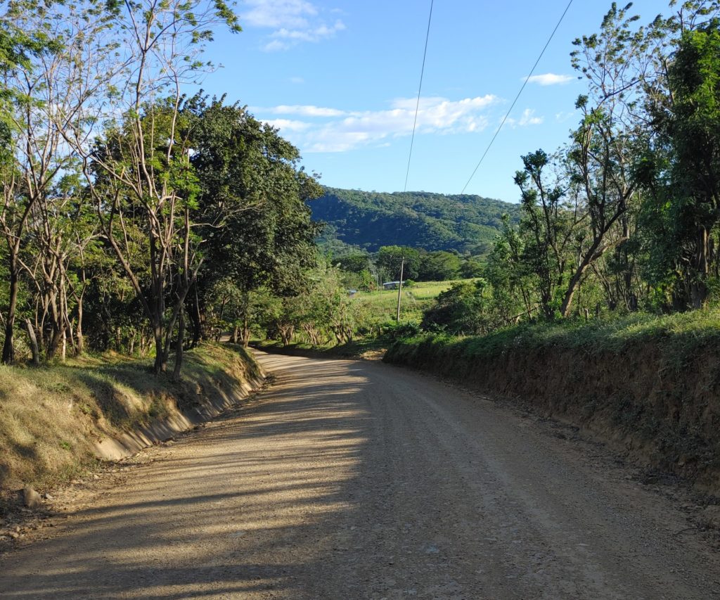 Empty dirt road.